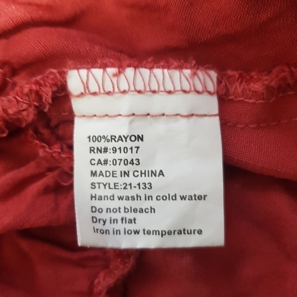 Solitaire Embroidered Swiss Dot Long Sleeved Blouse With Ruffle Hem - Picture 11 of 11